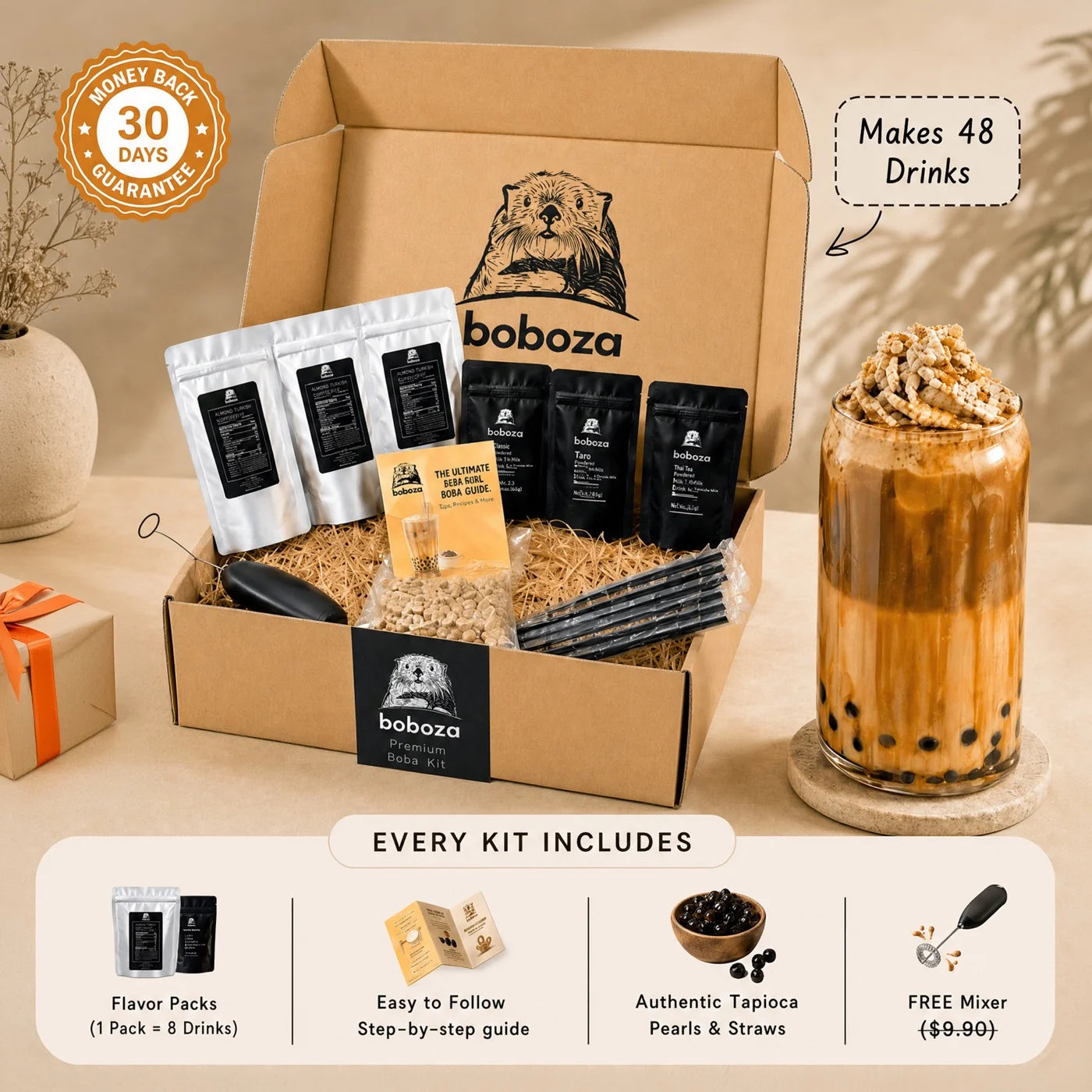 Open Boboza premium boba kit box with flavor packs, boba pearls, straws, mixer and guide, next to a finished iced boba drink
