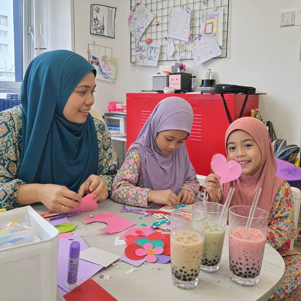 Family craft table with boba drinks