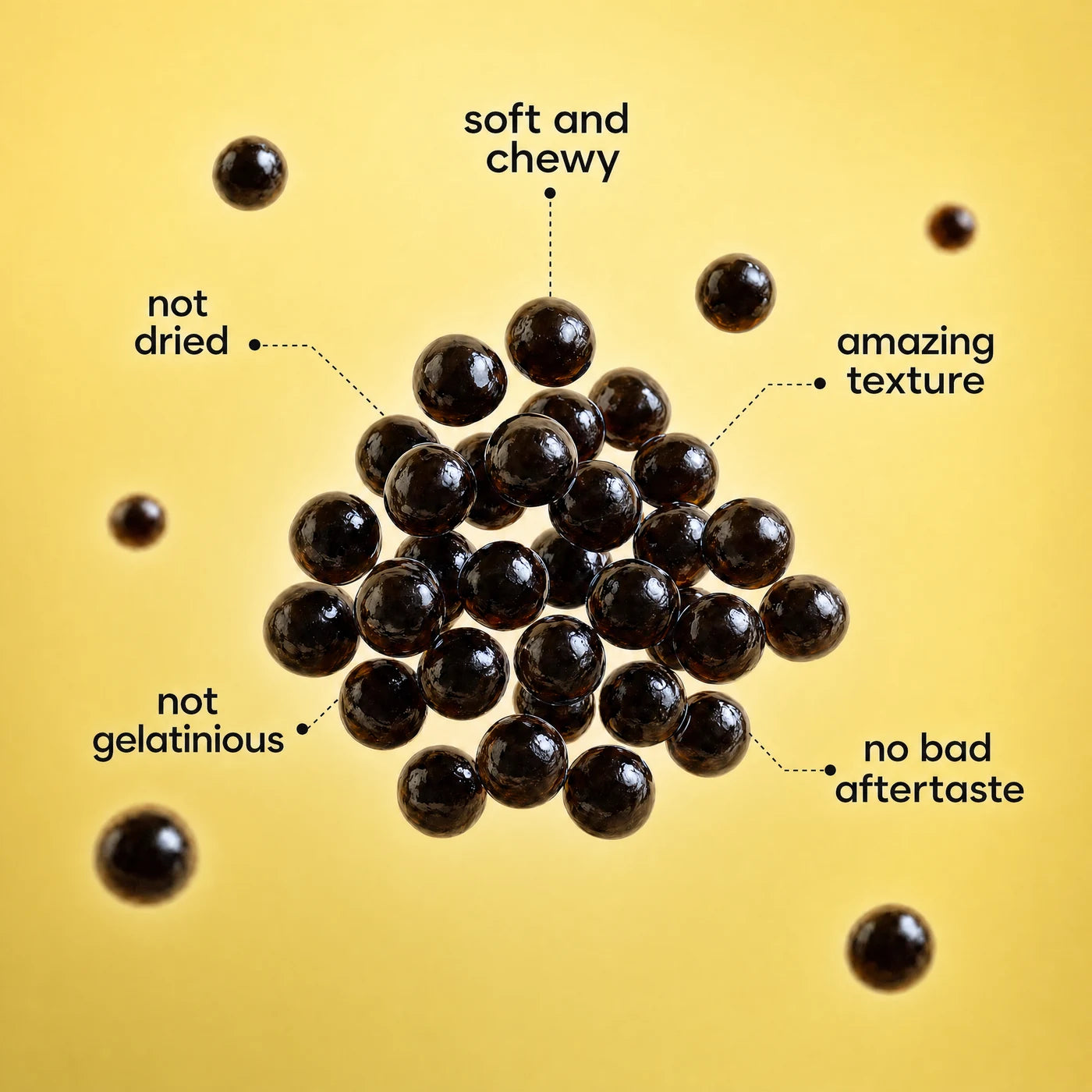 Glossy dark boba pearls floating on a yellow background with labels around them: soft and chewy, not dried, amazing texture, not gelatinous, no bad aftertaste